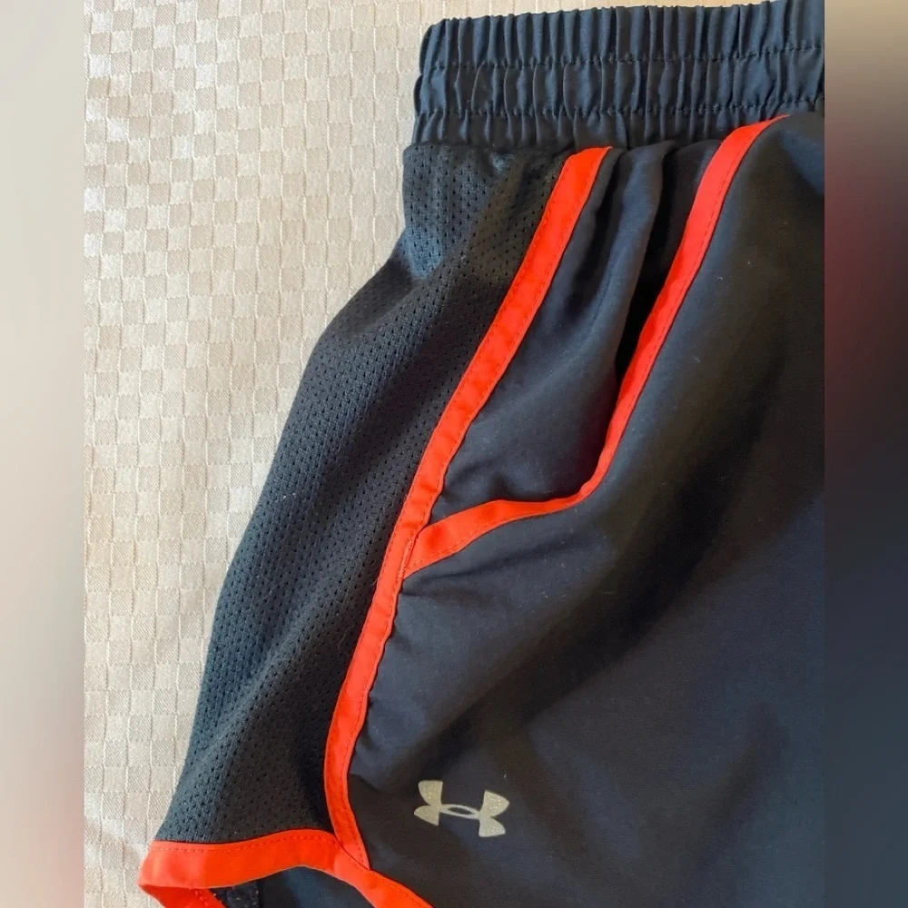 Under Armor black w/orange trip lined 3” inseam women’s running shorts. Size S. - Picture 2 of 7